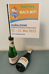 Flaschen mit muko.move-Fähnchen