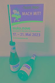 Flaschen mit muko.move-Fähnchen