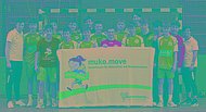 Handballmannschaft mit muko.move-Banner